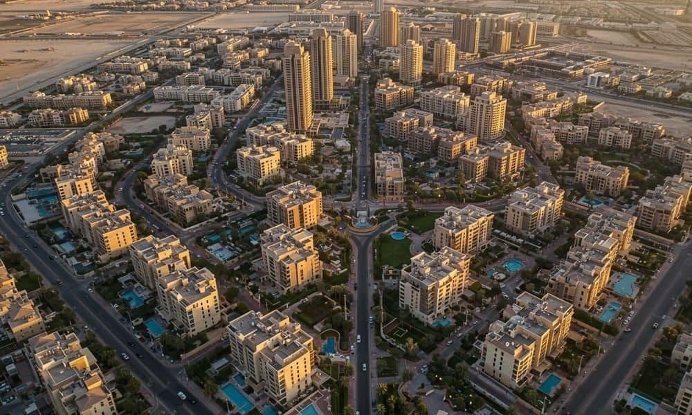 Residential buildings and landscaped streets in Arjan Dubai