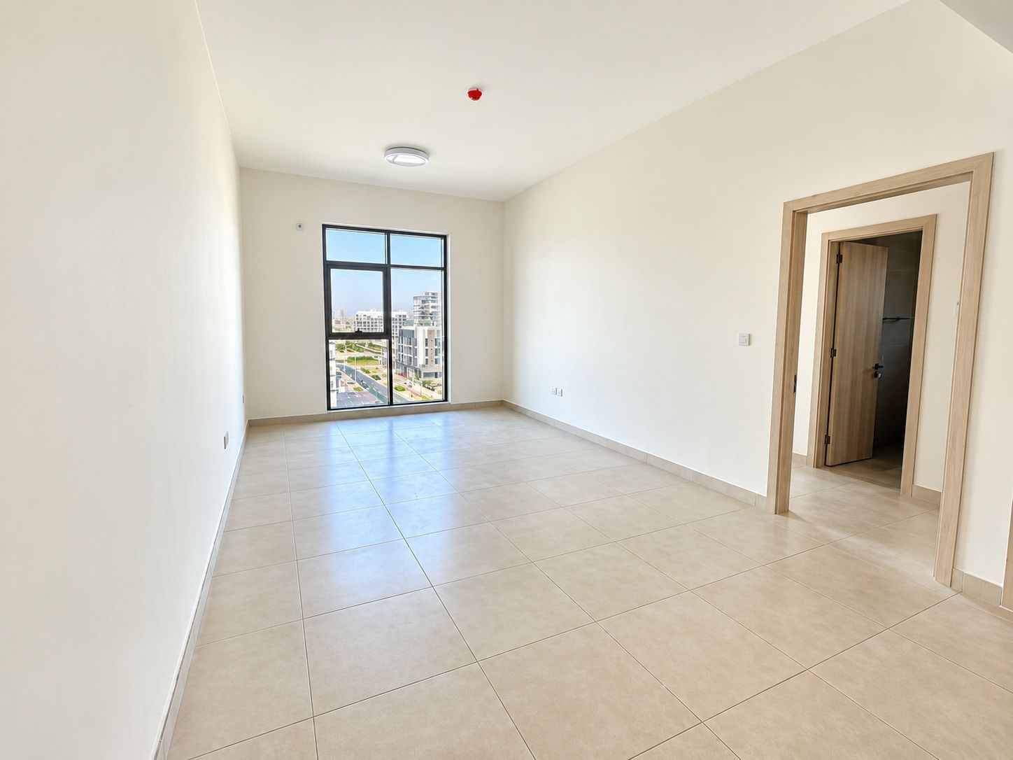 Unfurnished 1 bedroom apartment with skyline view in bliss homes dubai land residence complex dlrc exteriors media item