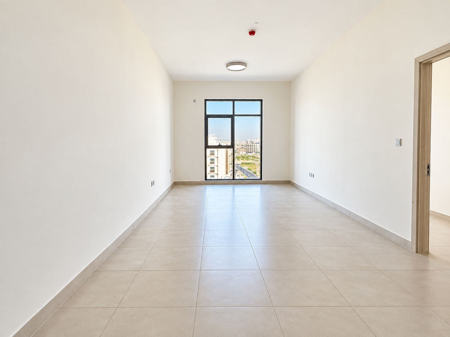 Unfurnished 1 bedroom apartment with skyline view in bliss homes dubai land residence complex dlrc exteriors media item