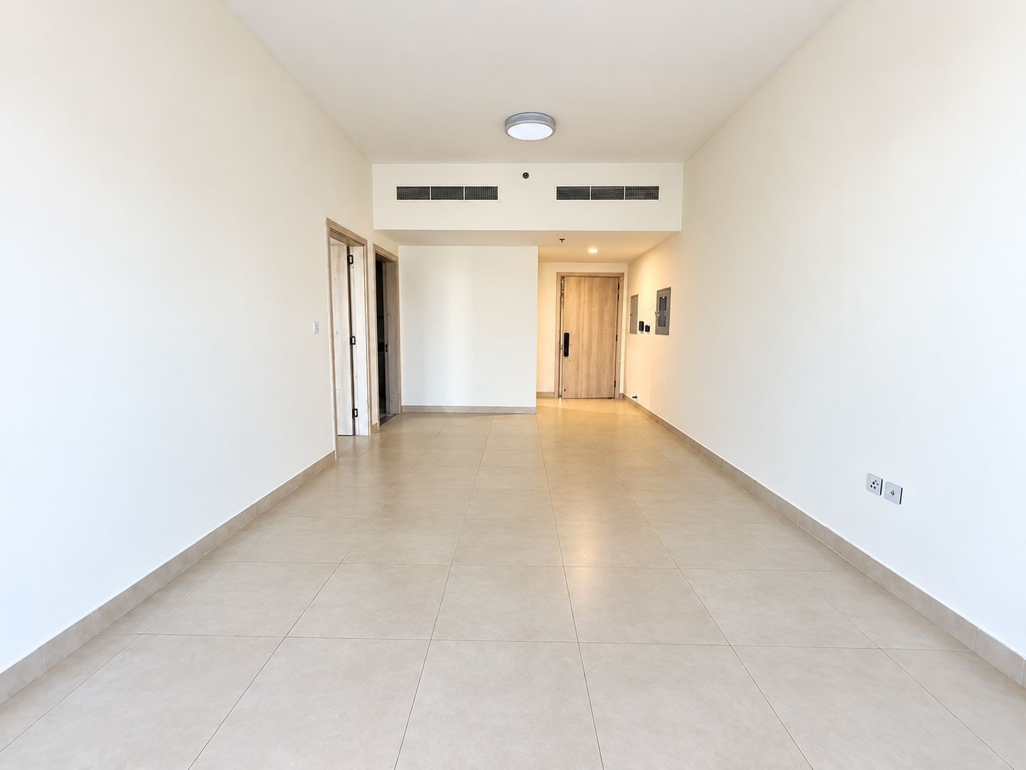 Unfurnished 1 bedroom apartment with skyline view in bliss homes dubai land residence complex dlrc exteriors media item
